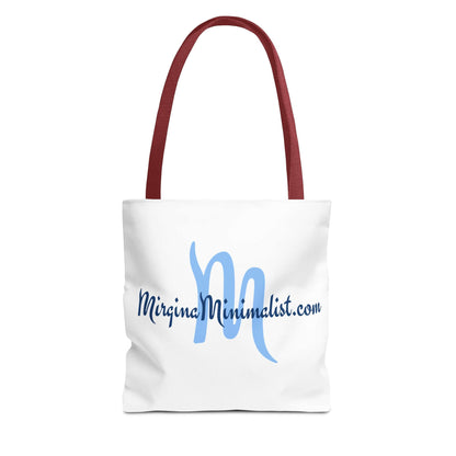 White tote bag with blue text and red handle on a white background